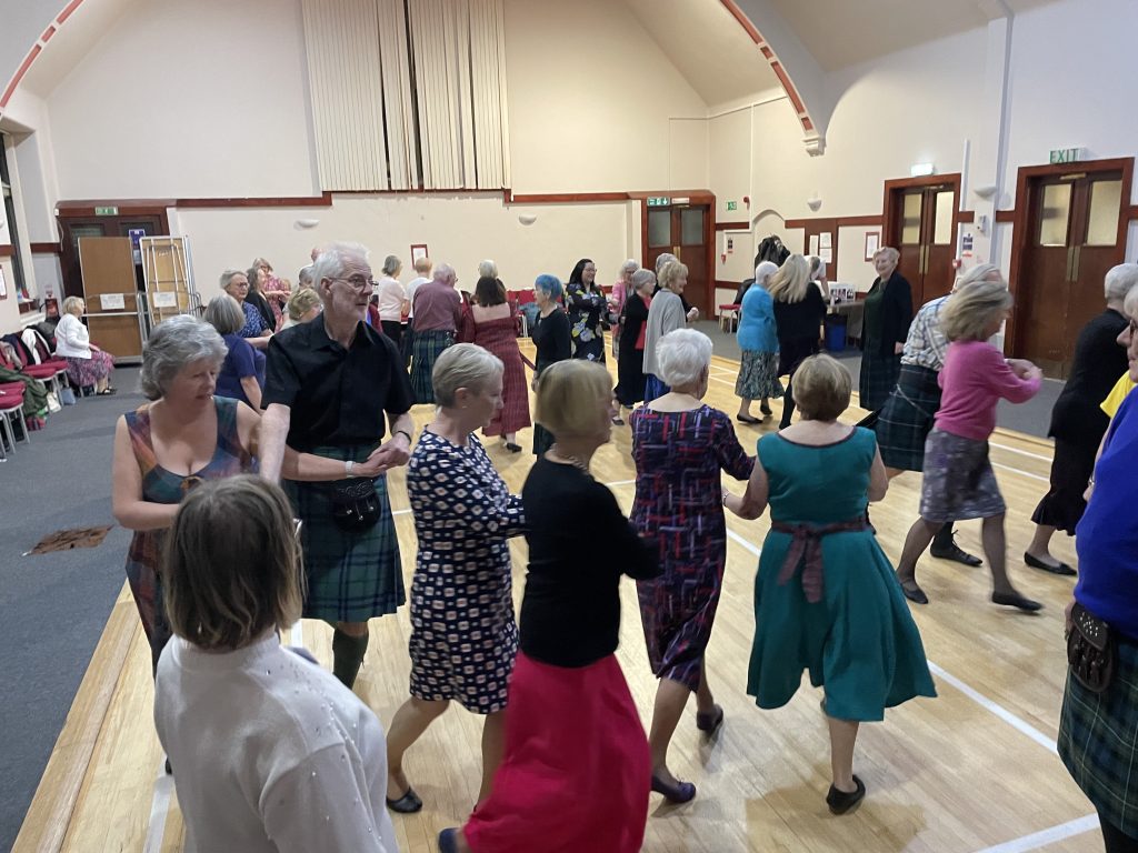 Dunfermline Scottish Country Dancers enjoying the first dance of the evening.